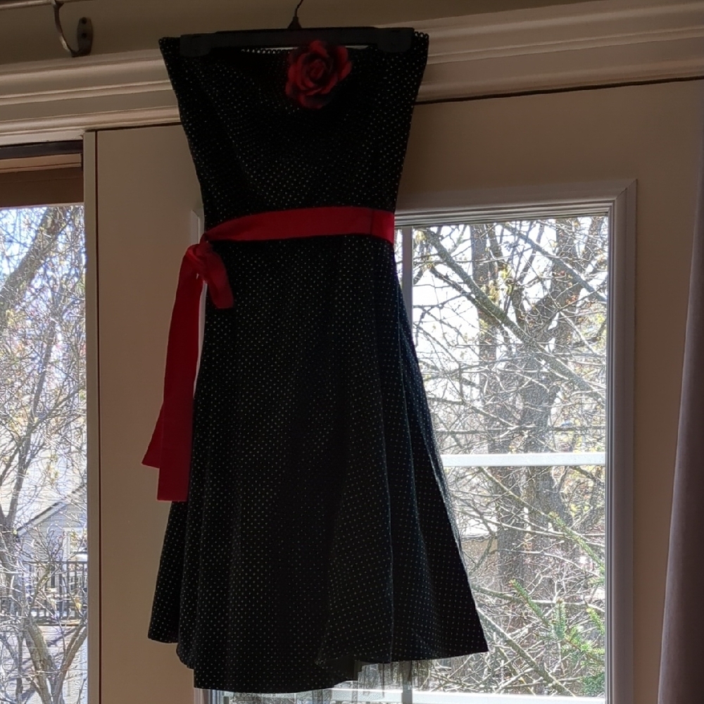 Elegant Black Polka Dot Dress with Red Accents
